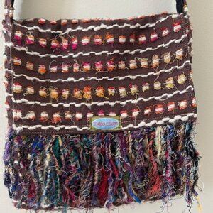Dharma Chakra crossbody bag, multi colored with brown base, 11" x 12"